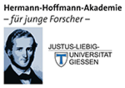 Logo Hermann-Hoffmann-Akademie Justus-Liebig-Universität Giessen